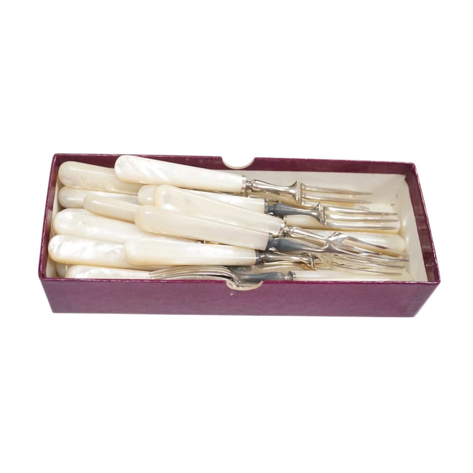 Twelve pairs of George V mother of pearl handled silver fruit knives by Atkin Brothers, Sheffield, 1933, knife 19.1cm. Condition - fair to good